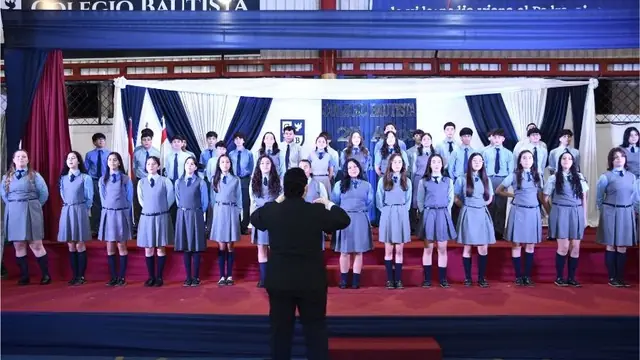El coro del CBAP en formación completa durante el acto institucional
